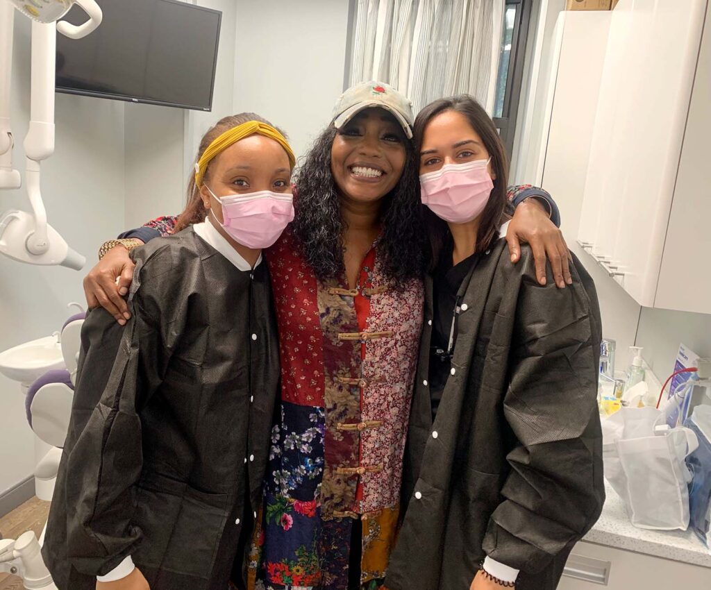 Three woman smiling and posing for picture at soul dental